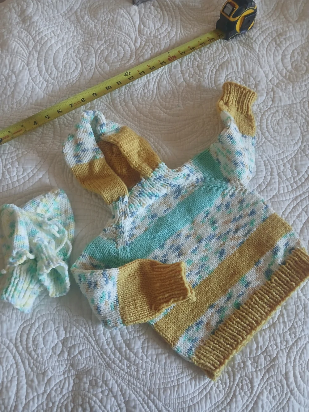 Various handknit toddler winter wear